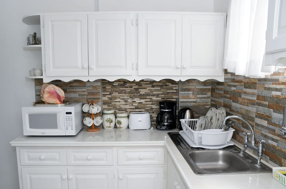 Apartment, Garden View | Private kitchen | Full-size fridge, microwave, oven, stovetop