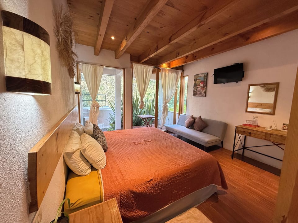 Family Room, Garden View | Desk, laptop workspace, bed sheets