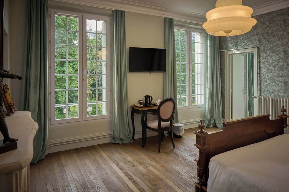 Superior Triple Room, Garden View (Château) | Individually decorated, individually furnished, desk, laptop workspace