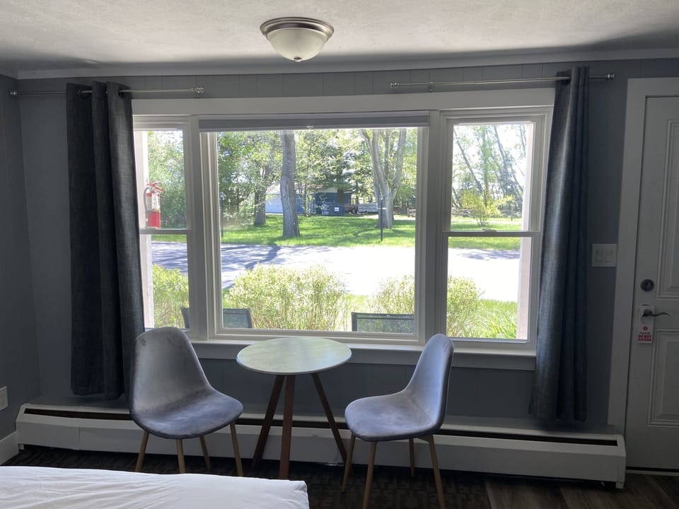 Blackout drapes, iron/ironing board, free cribs/infant beds