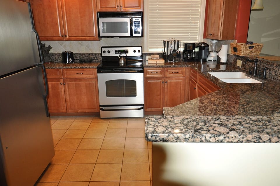 Cook Meals in the Fully Equipped Kitchen