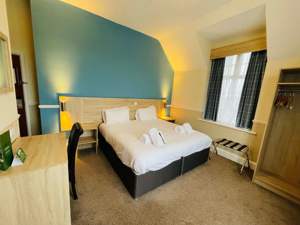 Desk, free WiFi, bed sheets