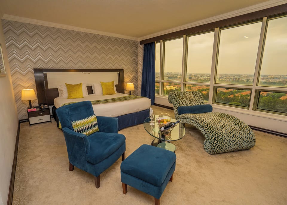 Executive Room with Skyline View | Premium bedding, minibar, in-room safe, desk