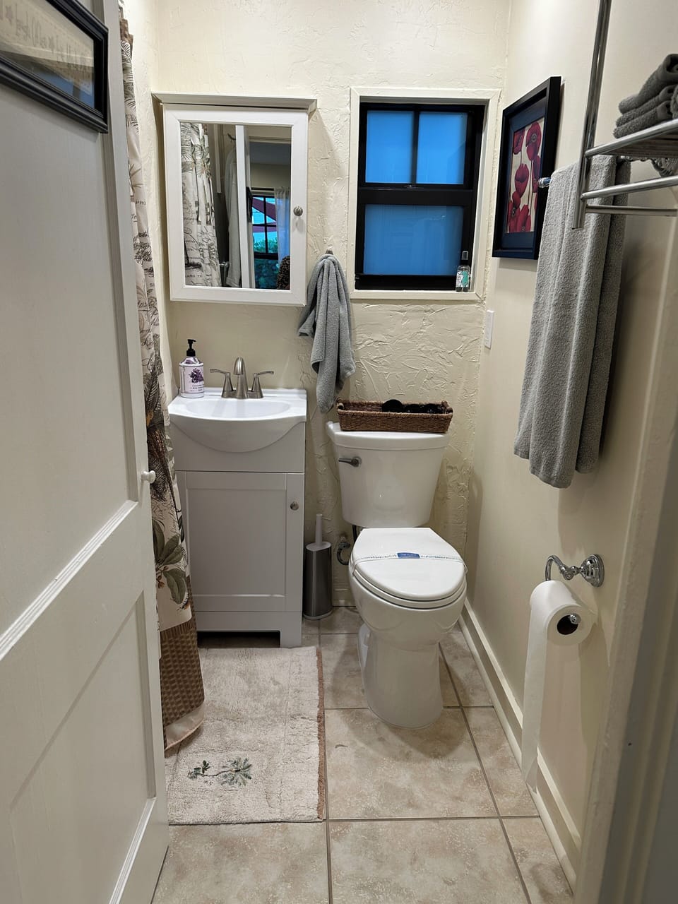 Another view of the bathroom with the privacy impact window. 