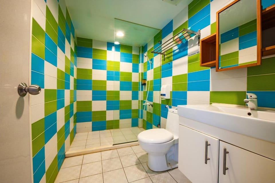 Quadruple Room | Bathroom | Shower, free toiletries, hair dryer, slippers