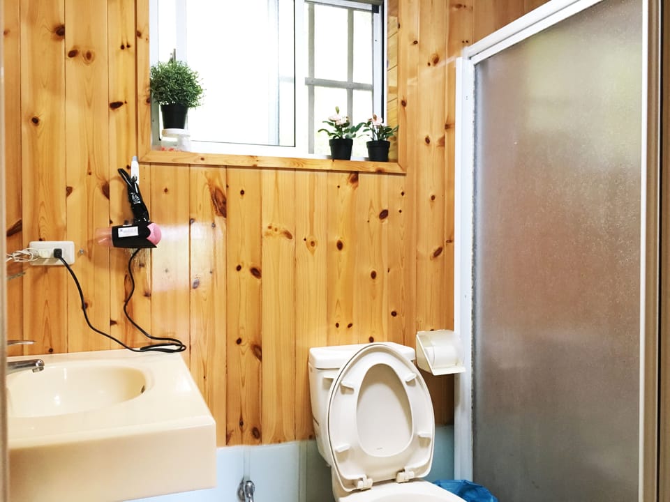 Family Quadruple Room, 2 Double Beds | Bathroom | Shower, free toiletries, hair dryer, slippers