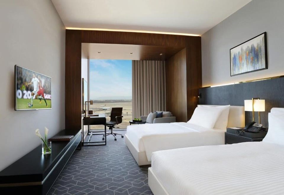 Egyptian cotton sheets, premium bedding, minibar, in-room safe