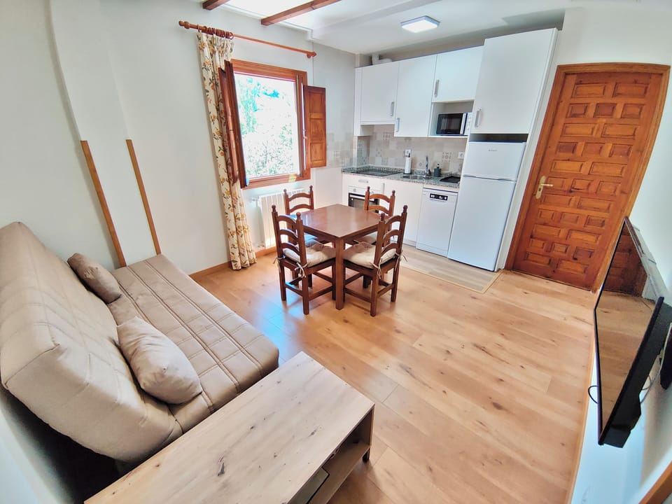 Apartment, 2 Bedrooms | Living area | 36-inch flat-screen TV with digital channels, TV