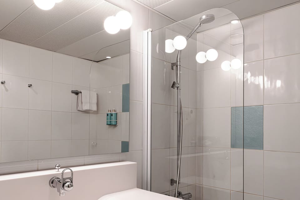 Superior Double Room, Multiple Beds | Bathroom | Eco-friendly toiletries, hair dryer, towels
