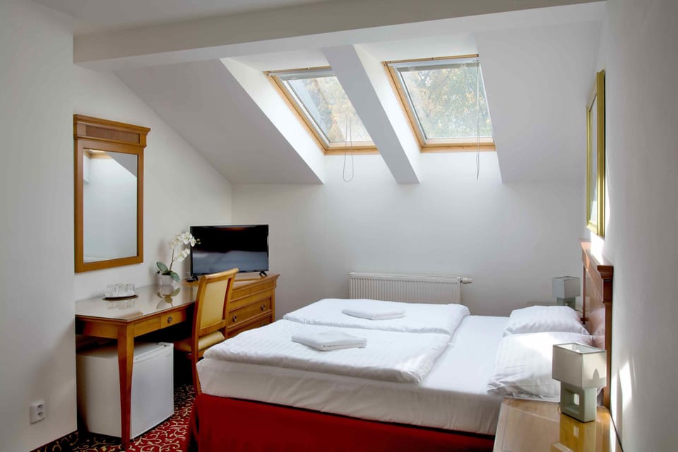 Standard Apartment, 2 Bedrooms (attic, promenade) | Hypo-allergenic bedding, desk, blackout drapes, iron/ironing board