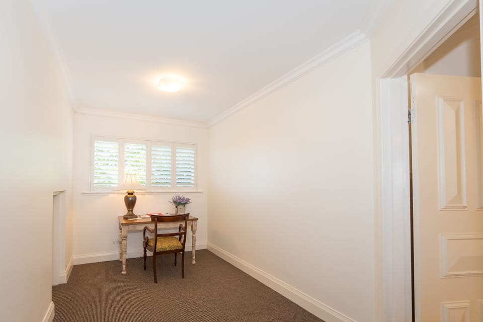 Premier Studio, 1 King Bed, River View | Living area | TV, DVD player