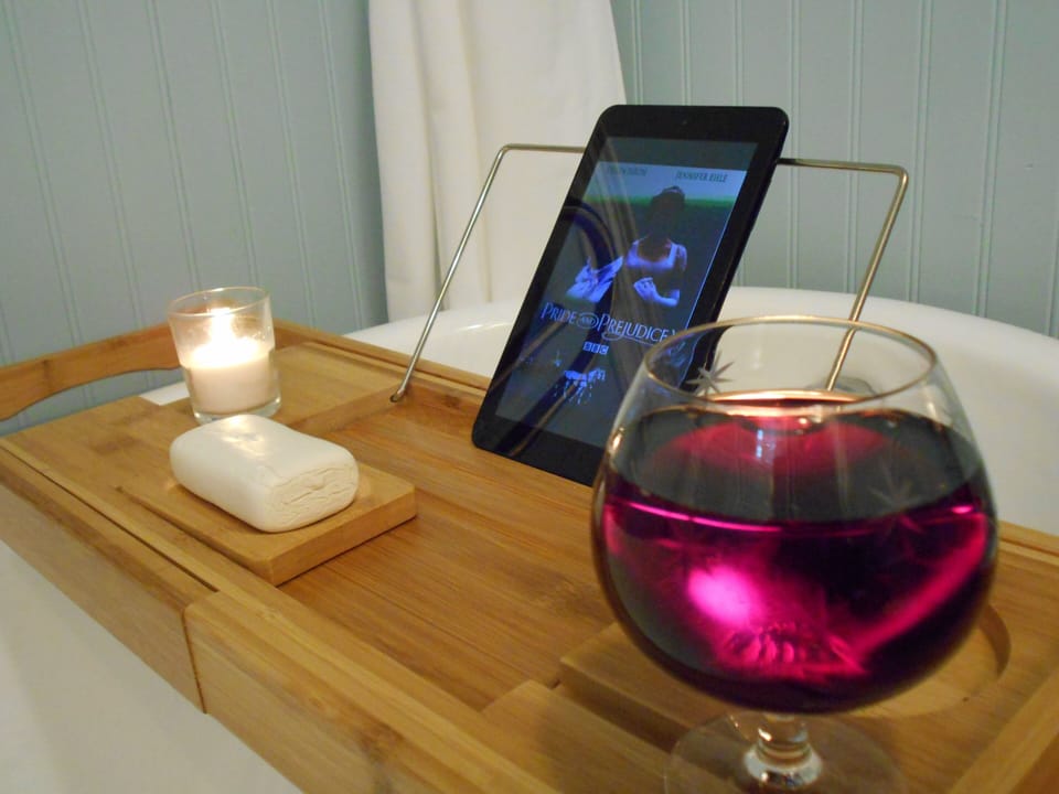 Relax in Clawfoot Tub Watching Good Movie on Tablet or Enjoy Good Book