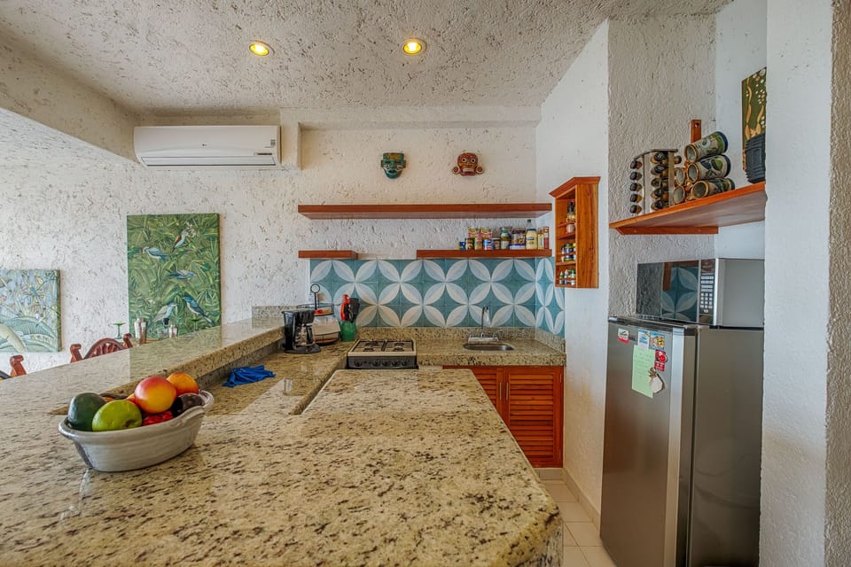 Full-size kitchen, now has full-size fridge (not shown here)