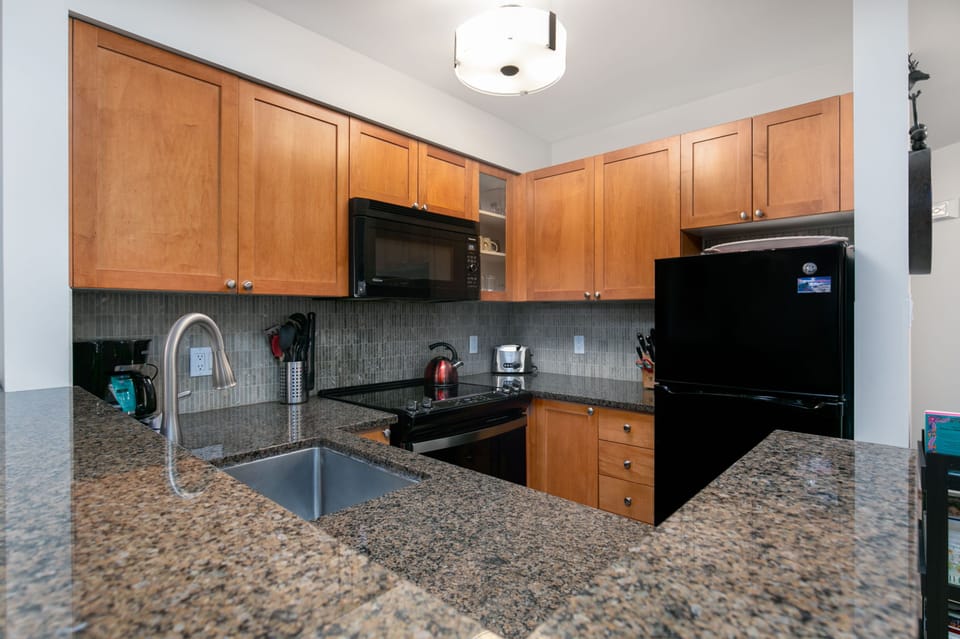 Kitchen - “Great unit. We really appreciated that the kitchen was so well stocked, it made dining in an easy option”