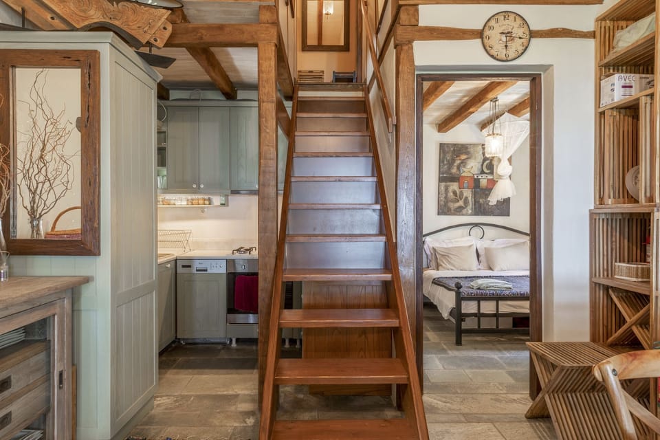 The stairs to upper level