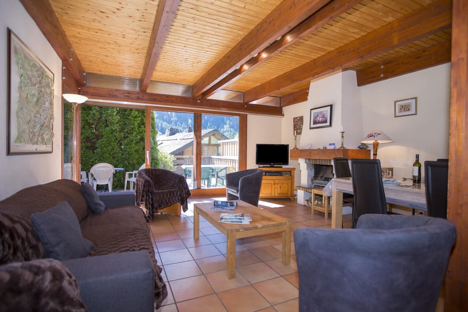 Spacious open plan living room with HDTV