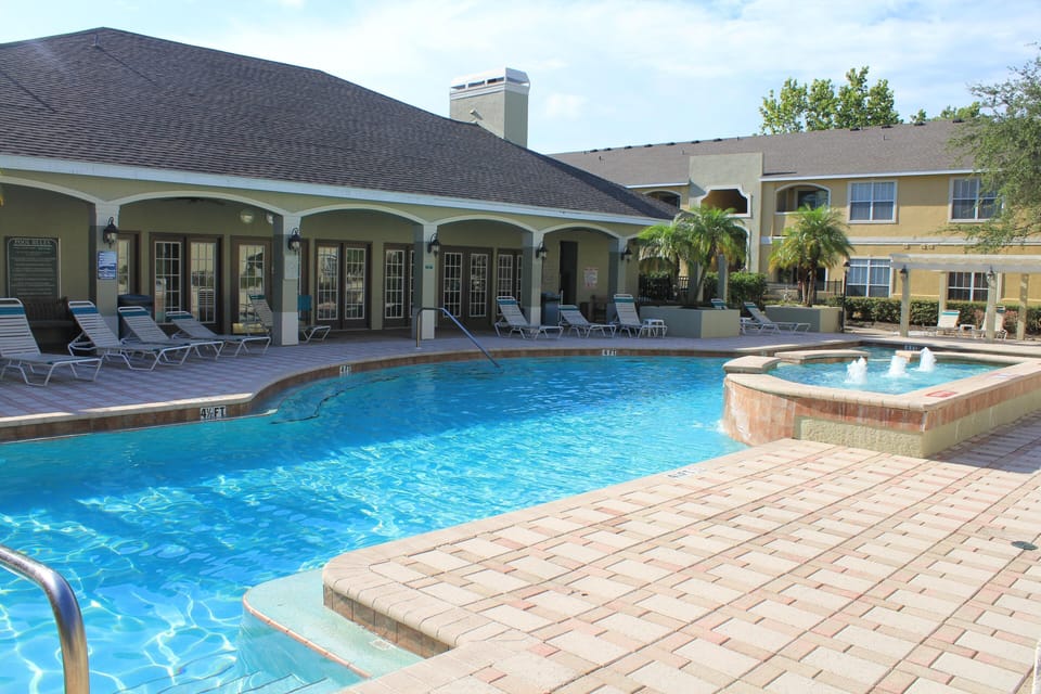 Heated resort pool with clubhouse.