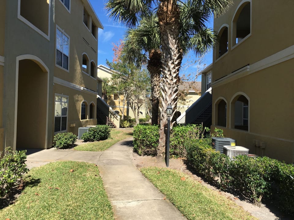 Walkway to pool area from condo
