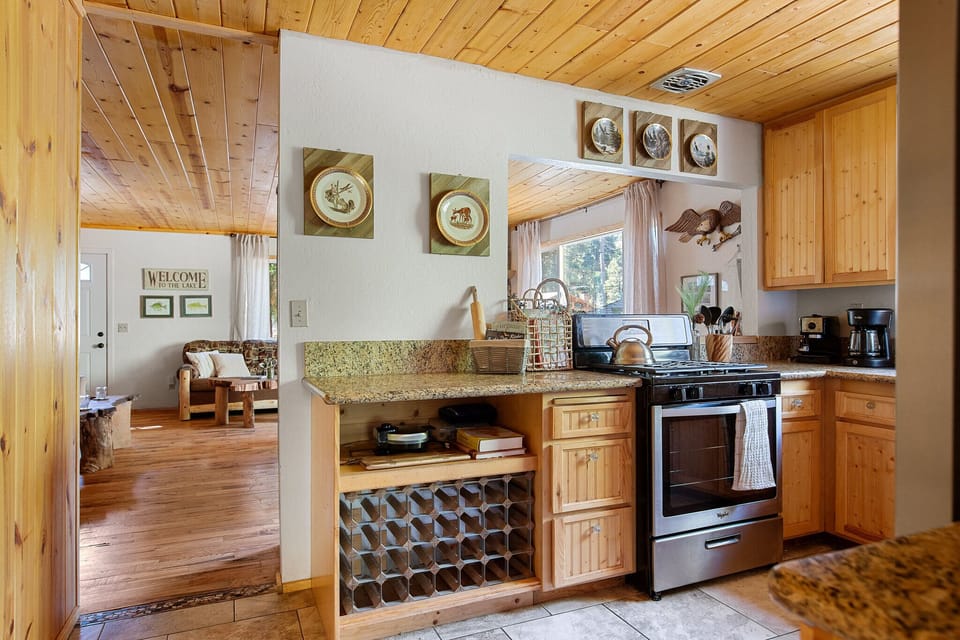 Kitchen decor includes a collection of vintage mountain wildlife plates
