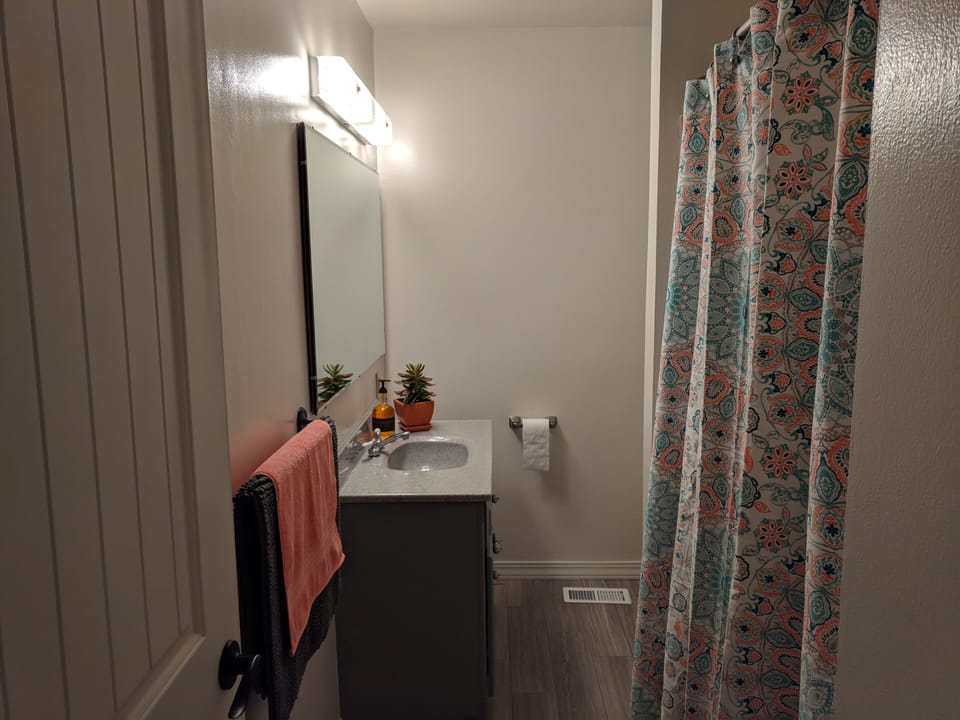 First bathroom.  Shower, tub combination