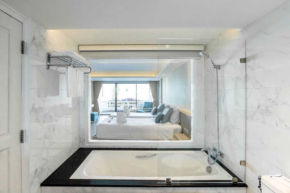 Superior Room | Bathroom | Free toiletries, slippers, towels