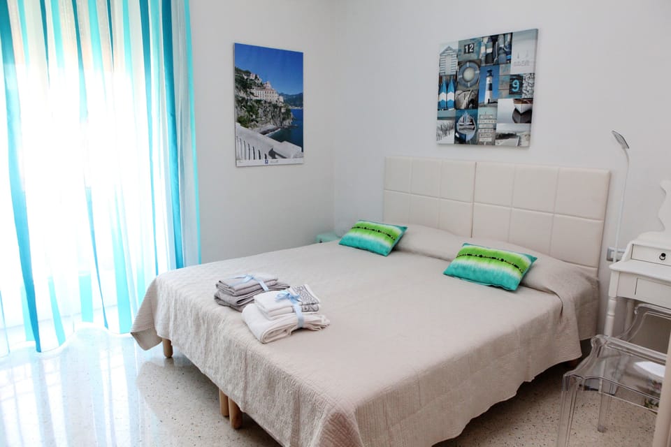 Hypo-allergenic bedding, down comforters, pillowtop beds, in-room safe