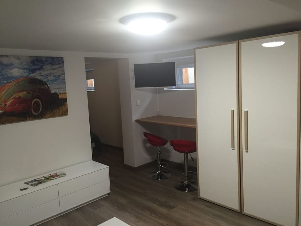 Classic Double Room (Chloé) | Living area | Flat-screen TV