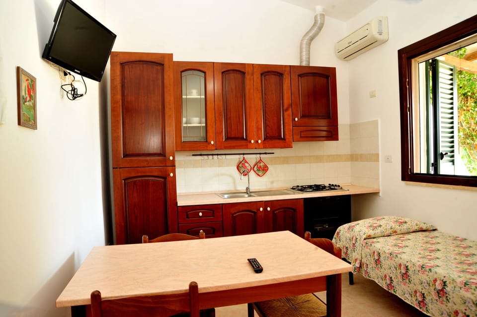 Family Apartment, 1 Bedroom | Living area | LCD TV