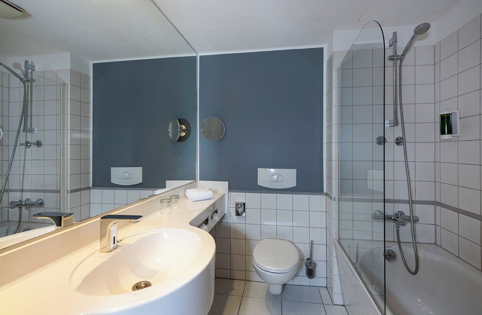 Eco-friendly toiletries, hair dryer, towels, shampoo