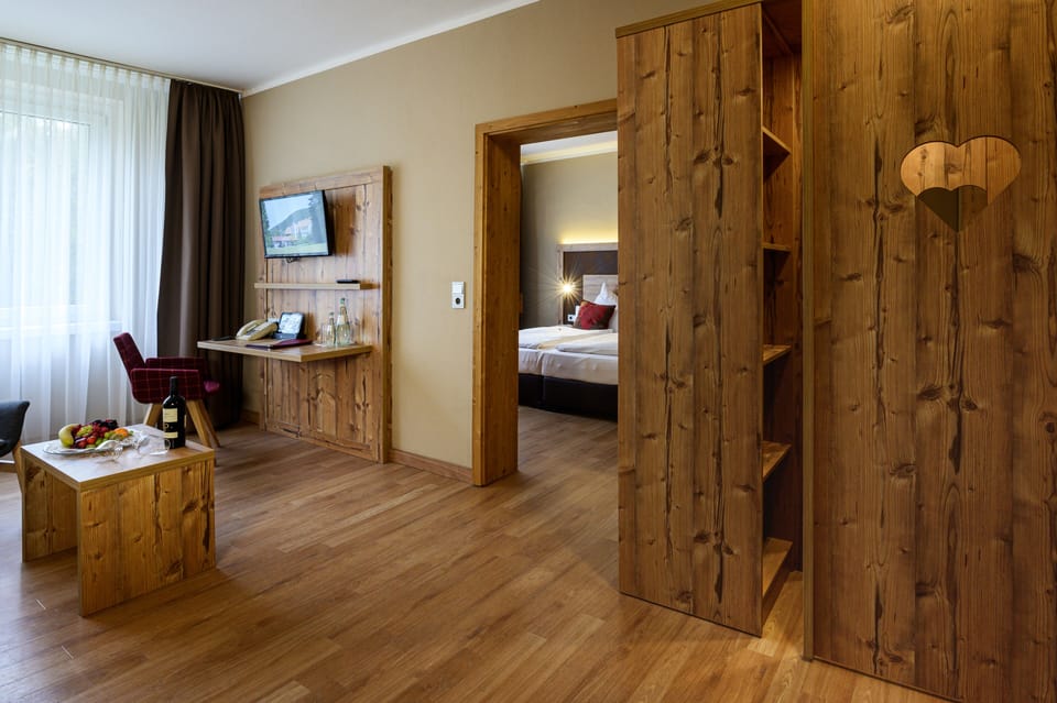 Suite, 2 Bedrooms, Garden Area | Living area | 55-cm flat-screen TV with satellite channels