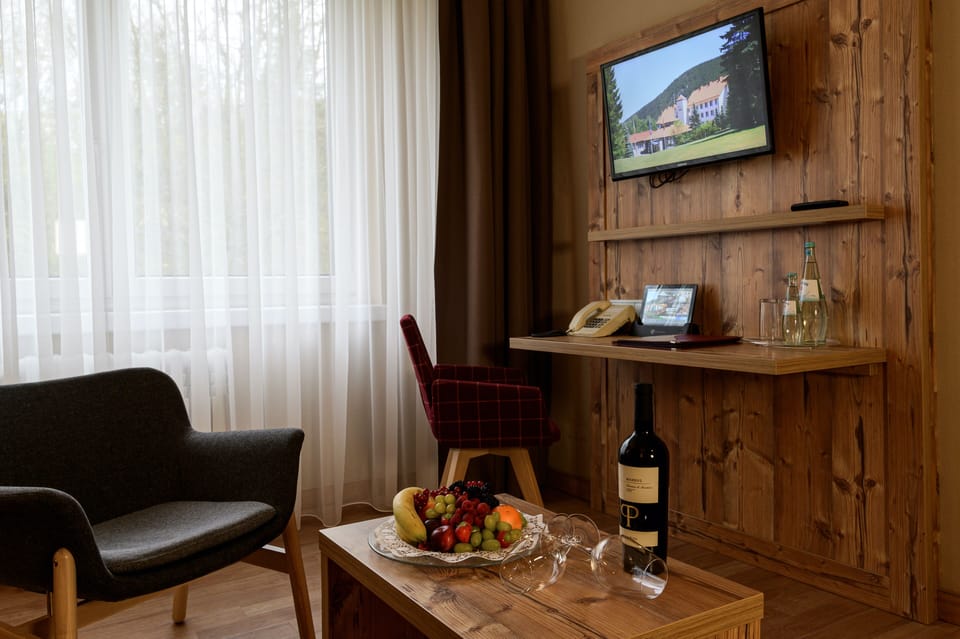 Suite, 2 Bedrooms, Garden Area | Living area | 55-cm flat-screen TV with satellite channels