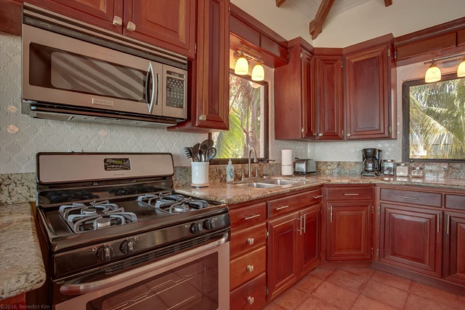 Luxury House, Multiple Bedrooms, Private Bathroom, Oceanfront | Private kitchen | Fridge, microwave, oven, stovetop