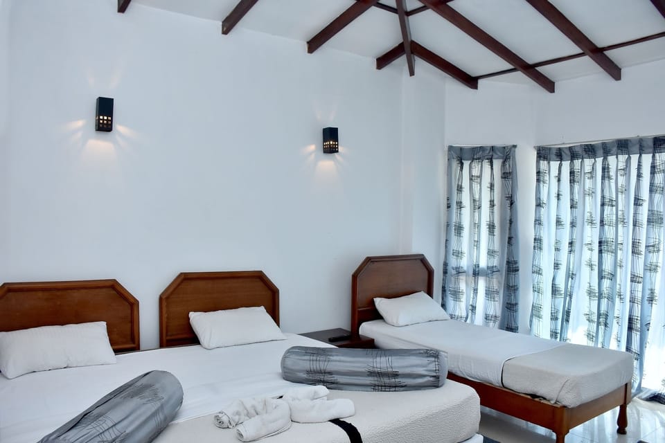 Deluxe Triple Room, 1 Bedroom, Hill View | 1 bedroom, premium bedding, desk, free WiFi