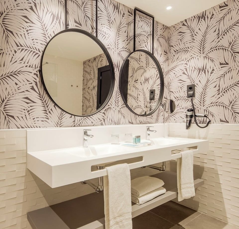Eco-friendly toiletries, hair dryer, bidet, towels