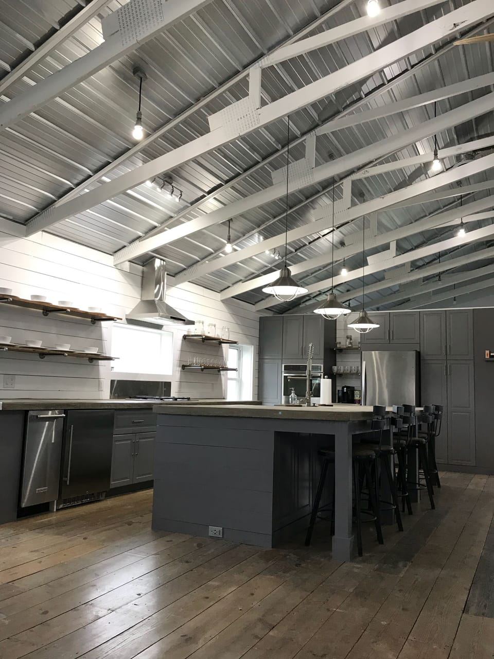 Gourmet kitchen with ice maker, coffee bar, double ovens, gas range and more. 