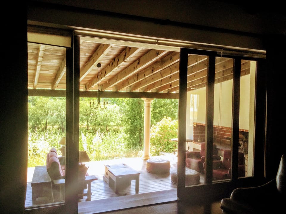 Studio - Door to the Front porch area, to the swimming pool 