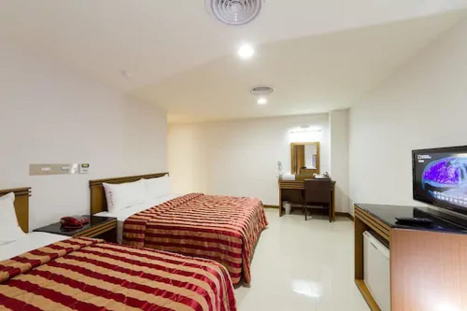 Standard Triple Room | Desk, blackout drapes, free WiFi, bed sheets