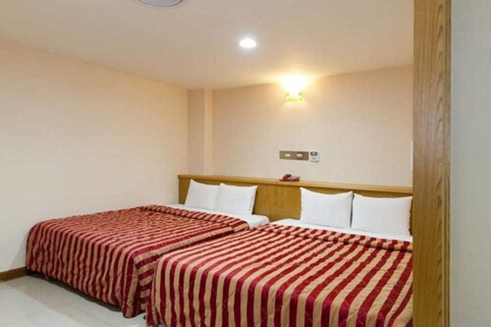 Standard Quadruple Room | Desk, blackout drapes, free WiFi, bed sheets