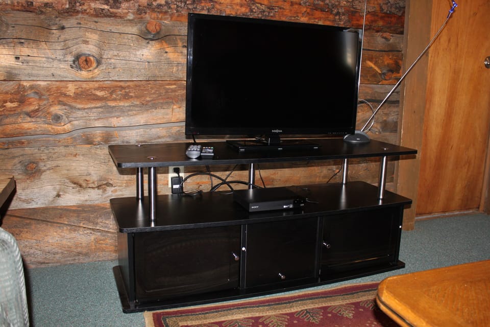 TV, with new TV stand and DVD/Blue ray player. NO SATELLITE TV