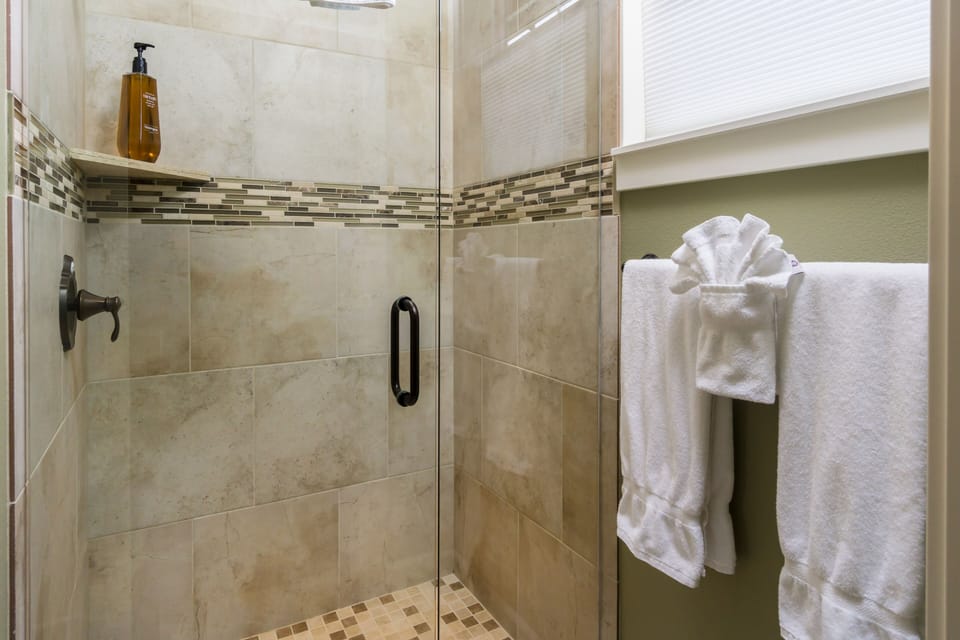 Relax in the Luxurious Walk in Shower. 