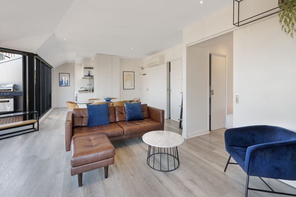2 Bedroom Penthouse Apartment with Panoramic Views | Living area | Flat-screen TV