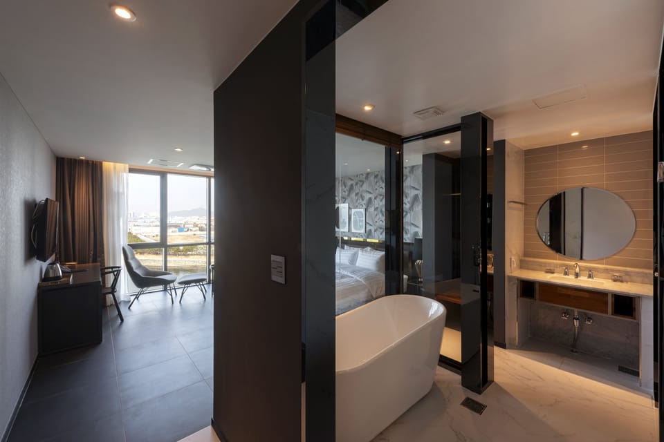 Premium Double Room, 1 King Bed, Private Bathroom, Beachfront | Down comforters, soundproofing, free WiFi, bed sheets