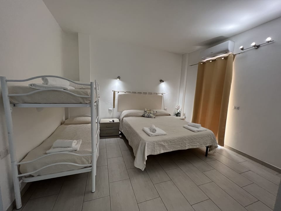 Comfort Room, Partial Sea View (Molara) | Iron/ironing board, cribs/infant beds, free WiFi, bed sheets