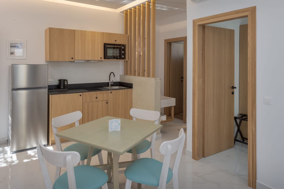 Apartment (Quadruple) | Private kitchen | Mini-fridge, stovetop, coffee/tea maker, electric kettle
