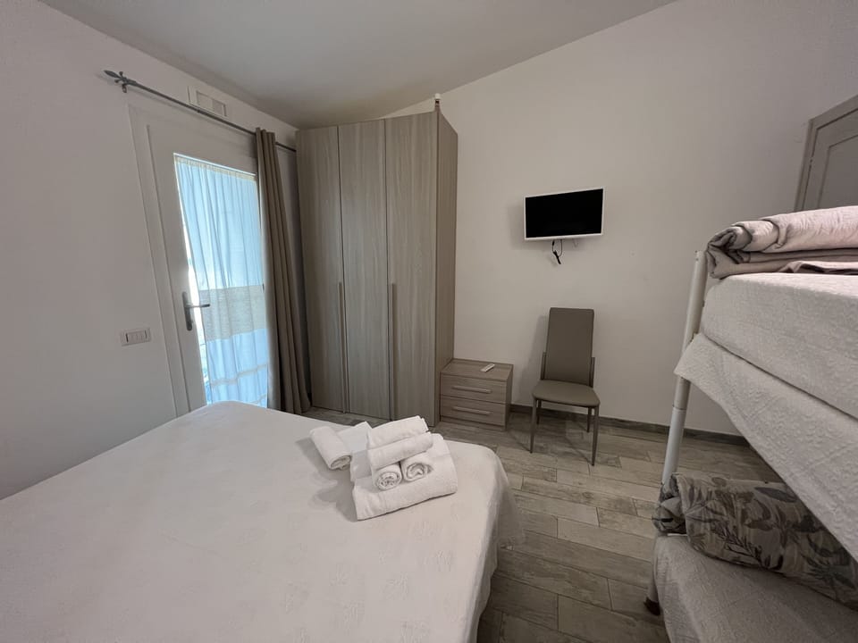 Classic Quadruple Room | Bed sheets