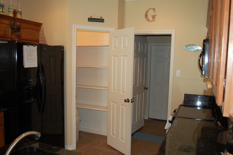 Side by Side with Ice Maker.  Spacious Pantry