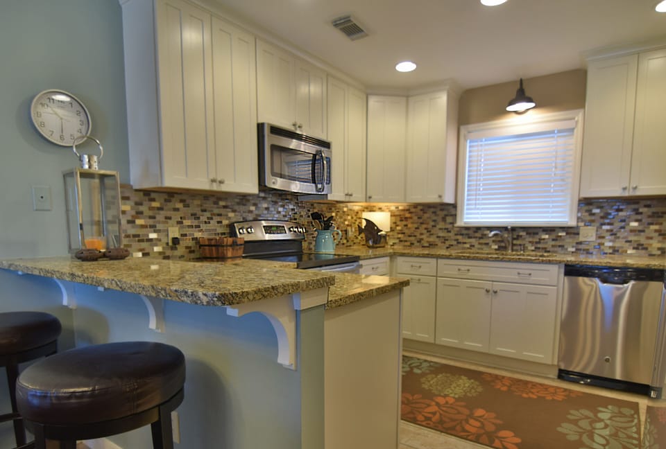 Updated and well stocked Kitchen with stainless steel appliances