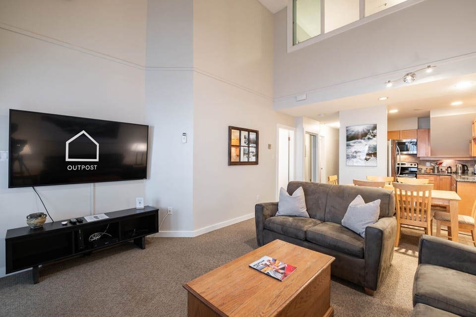 Living area: Gas fireplace, smart TV, Queen sofa bed, access to balcony