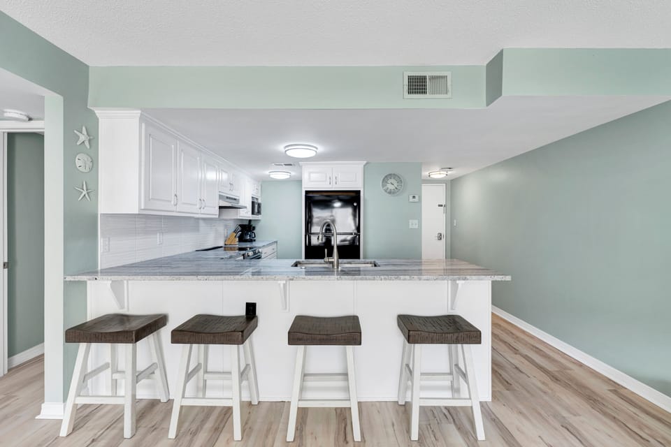 Kitchen bar with stools. 