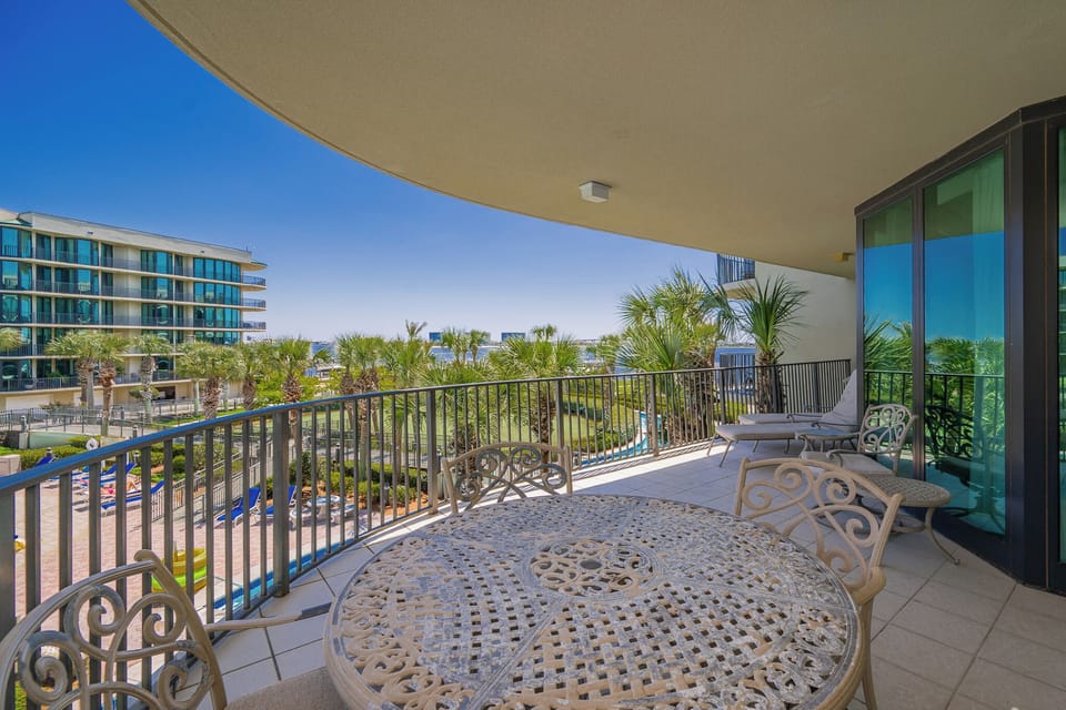 Relax on the balcony, surrounded by palm trees, soaking in the warm sun, and enjoying gentle coastal breezes